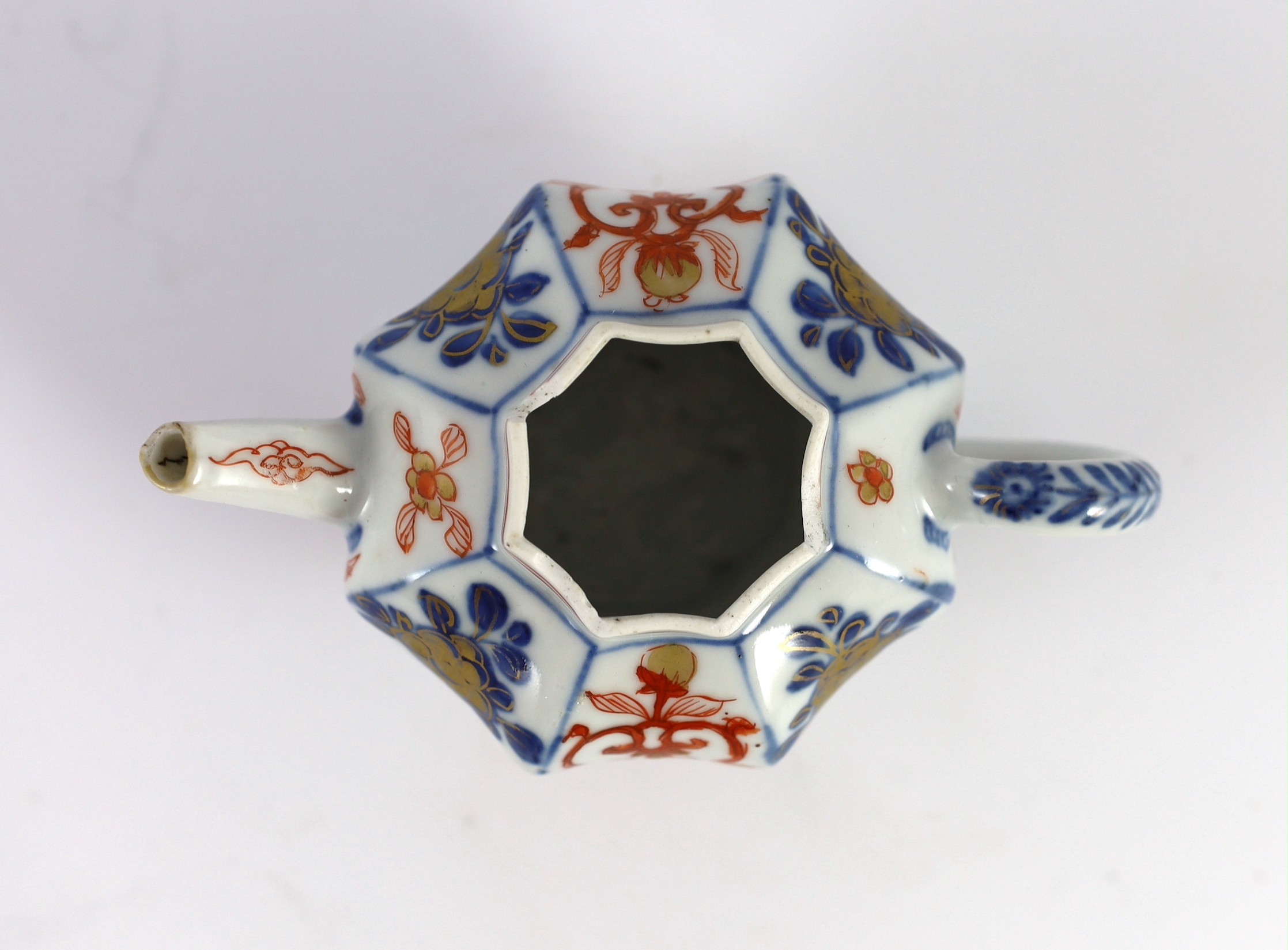 A small Chinese Imari octagonal teapot, Kangxi period, 10 cms high, 10.2 cm high, Rim chips